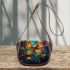 Colorful butterfly with feathers on its wings saddle bag