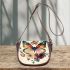 Colorful butterfly with flowers on its wings saddle bag