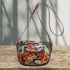Colorful cute frog in the style of mesmerizing optical illusions saddle bag