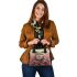 Colorful cute frog in the style of mesmerizing optical illusions shoulder handbag