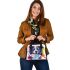 Colorful drawing of an adorable border collie shoulder handbag