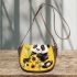 Cute baby panda with sunflowers on a yellow saddle bag
