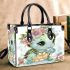 Cute baby turtle wearing jewelry and flowers small handbag