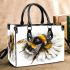 Cute bee sitting on daisy flower small handbag