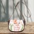 Cute bunny sitting on top of an carrot hello spring saddle bag