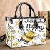 Cute cartoon drawing of a smiling bee small handbag