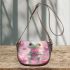 Cute cartoon frog holding a pink heart saddle bag