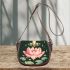 Cute cartoon frog jumping on top of a pink lotus flower saddle bag