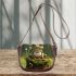 Cute cartoon frog sitting on a tree stump with big eyes saddle bag