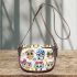 Cute cartoon owls sitting on tree branches saddle bag