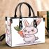 Cute cartoon rabbit holding a carrot small handbag