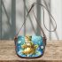 Cute frog wearing a crown sitting on a golden ball saddle bag
