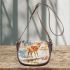 Cute little deer standing in the snow saddle bag