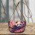 Cute little panda surrounded by pink cherry blossoms saddle bag