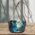 Cute owl with big blue eyes perched saddle bag