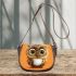 Cute owl with big eyes holding a white coffee cup saddle bag