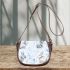 Cute pastel blue bunnies and floral pattern saddle bag