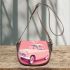 Cute pink owl sitting on top of a cute pastel car saddle bag