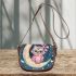 Cute pink owl with a bow and glasses sitting on the moon saddle bag