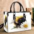 Cute smiling bee sitting on a daisy flower small handbag