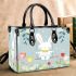 Cute white rabbit sitting on the swing small handbag