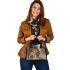 Deer with huge antlers stands in the forest shoulder handbag