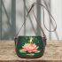 Frog on a lily pad jumping into a pink lotus flower cartoon saddle bag