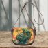 Green frog sitting on top of an island with trees and flowers saddle bag