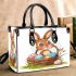 Happy easter bunny with a basket full of colored eggs small handbag