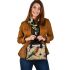 Lines to create patterns around parrot itself shoulder handbag