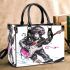 Monkey wearing sunglasses skiing with electric guitar small handbag