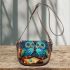 Owls in teal blue and turquoise colors saddle bag