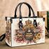 Queen bee sitting on top of honeycomb small handbag