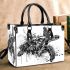 Sea turtle in black and white small handbag