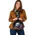 Surreal canine wonderland shoulder handbag