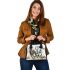 Three horses are galloping in the wind shoulder handbag