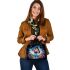 Tranquil butterfly oasis shoulder handbag