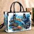 Turtle swimming among coral reefs small handbag