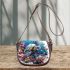 Turtle swimming among coral reefs saddle bag