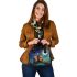 Two cute cartoon owls sitting on a log in love shoulder handbag