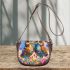 Two cute owls sitting on flowers saddle bag