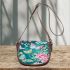 Vibrant pattern of pink and turquoise butterflies saddle bag