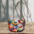 Watercolor painting with colorful patterns and shapes saddle bag