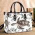 Watercolor sea turtle with flowers and leaves small handbag