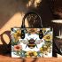 Bee in the center surrounded by flowers small handbag