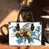 Bumblebee holding a blue forgetmenot flower small handbag