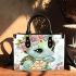 Cute baby turtle wearing jewelry and flowers small handbag