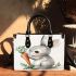 Cute cartoon rabbit holding a carrot small handbag