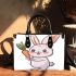 Cute cartoon rabbit holding a carrot small handbag