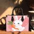 Cute cartoon rabbit playing with a carrot small handbag